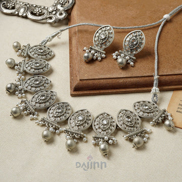 Dajinn Prabhavati Silver Oxidised White Necklace Set