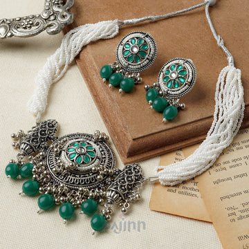 Dajinn Vijayalaxmi Silver Oxidised Green Necklace Set