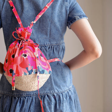 Dajinn Pink Sands Basket Weave Drawstring Backpack/ Sling