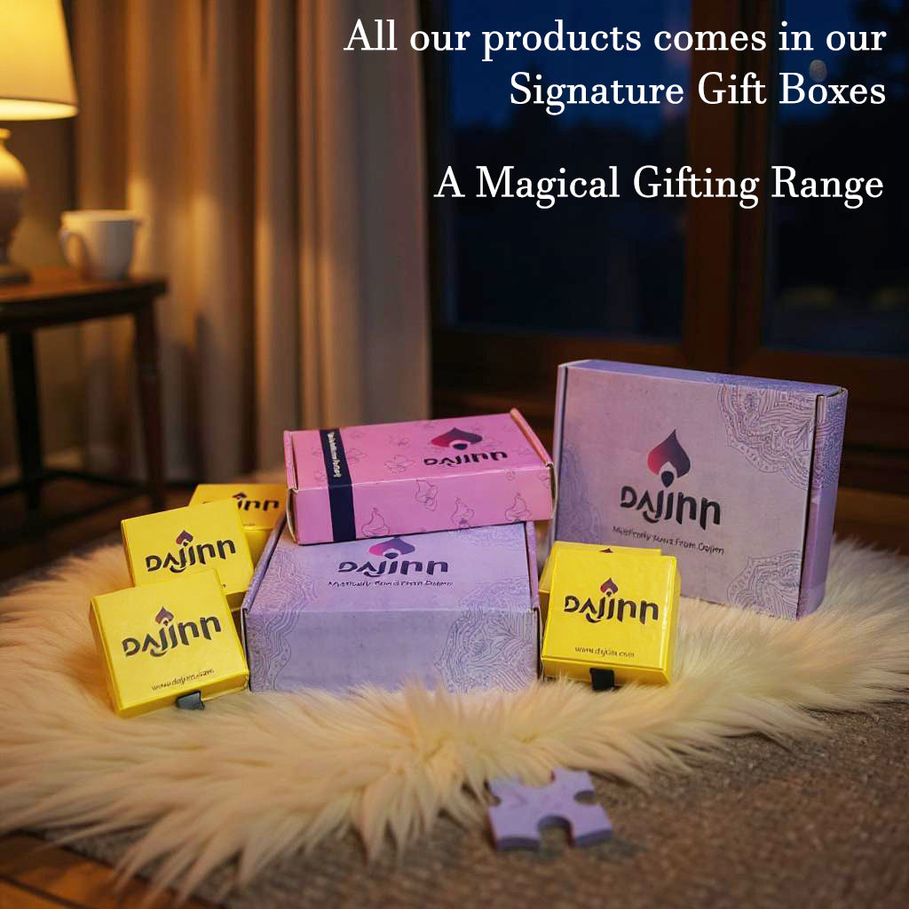 Colorful gift boxes from Dajinn in yellow, purple, and pink, arranged on a soft white rug with a cozy ambiance.